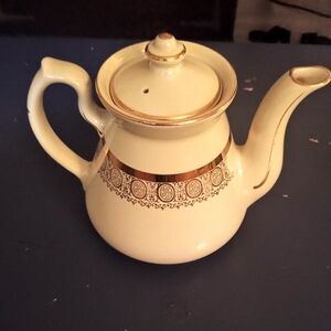 Elegant Cream and Gold Teapot